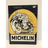 A reproduction rectangular metal sign, "Michelin", with Michelin Man on a motorbike,