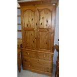 A modern pine linen press,