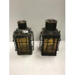 A pair of Victorian painted metal hanging ships style lanterns set with amber coloured glass panels