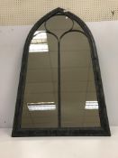 A painted metal framed Gothic arch wall mirror 59 cm wide x 114 cm high
