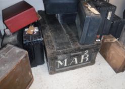A collection of various trunks and suitcases to include a Victorian painted ebonised and slatted