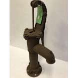 A cast iron garden pump in the Victorian manner,