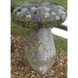 A natural stone staddle stone,