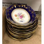 A set of early 20th Century blue and gilt decorated dishes and plates,