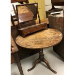 An early 19th Century oak pedestal tea table on tripod base, 73 cm diameter,