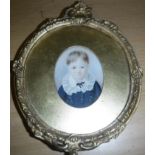 EARLY 19TH CENTURY SCHOOL "Young Boy Wearing a Lace Collar and Blue Jacket", miniature on ivory,