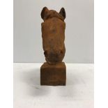A cast iron Horse head on block ornament