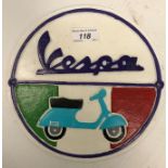 A modern painted cast metal sign "Vespa"