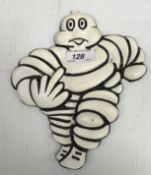 A modern painted cast metal sign "Michelin Man / Up Yours"