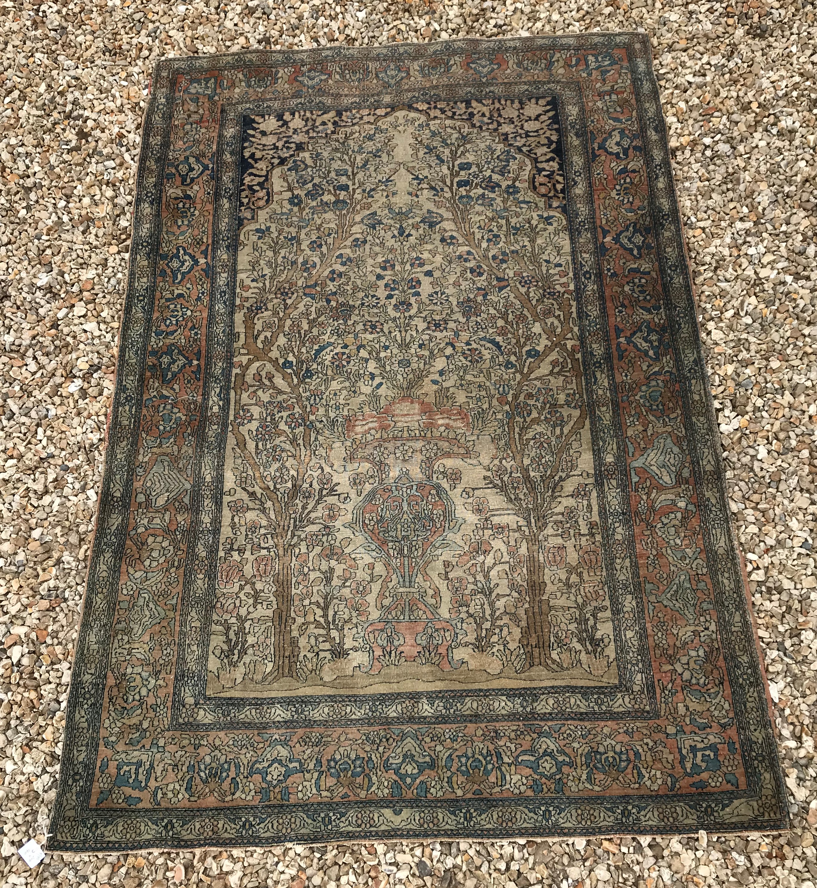 A fine Isphan rug with central Tree of Life decoration on a cream ground,