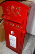A modern vintage style red painted post box inscribed "GVI R Letters Only" Size approx 59cm high x