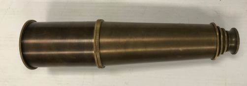 A modern reproduction brass four draw telescope inscribed "Broadhurst Clarkson & Co.