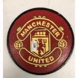 A modern painted cast metal sign "Manchester United"