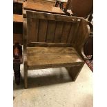 A waxed and stained pine miniature pew with lap and groove back and fretwork carved sides, 80.