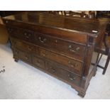 A 19th Century North Country oak and crossbanded mule chest with rising lid with two dummy drawers