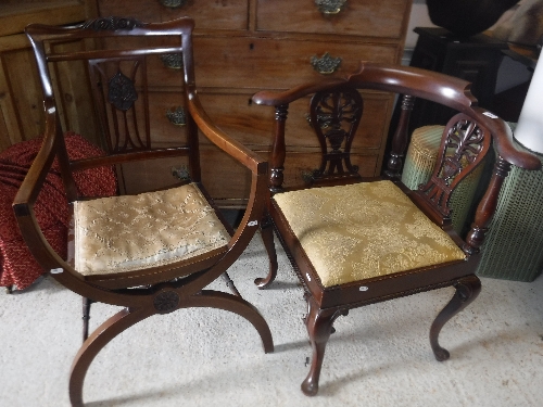 An Edwardian mahogany yoke back corner chair in the Georgian style with drop-in upholstered seat,