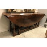 A modern oak wake table in the 18th Century manner,