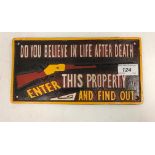 A modern painted cast metal sign "Do You Believe In Life After Death? Enter This Property And Find