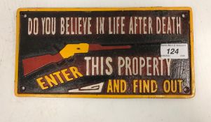 A modern painted cast metal sign "Do You Believe In Life After Death? Enter This Property And Find