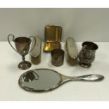 A collection of silver wares comprising a silver cigarette case, silver twin-handled trophy cup,