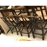 Six various 19th Century dining chairs in the Chippendale taste, one with arms,