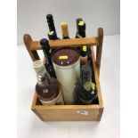 A mixed lot of wines and spirits including Harveys Bristol Cream Sherry 1 litre and 75cl,