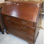 A George III mahogany oak bureau,