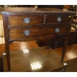 A 19th Century mahogany side table of two short over one long drawer on square tapered legs,