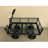 A 37" x 20" metal twin axle garden trolley