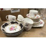 A Royal Crown Derby floral decorated tea set comprising five teacups, six saucers, six tea plates,