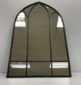 A painted metal Gothic arch frame mirror,