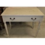 A pair of white painted single drawer side tables in the Regency style,