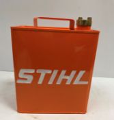 A modern painted metal fuel can inscribed "Stihl"