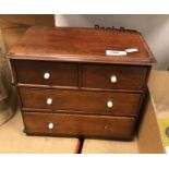 A miniature Victorian chest of two short over two long drawers