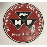 A painted cast metal sign "Nothing Pulls Like a Massey - Massey Ferguson"
