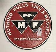 A painted cast metal sign "Nothing Pulls Like a Massey - Massey Ferguson"