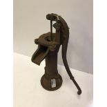 A cast iron garden pump in the Victorian manner,