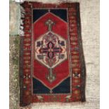 Three various rugs including a Chinese superwash rug,