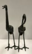 Two modern verdigris patinated bronze crane figures