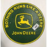 A painted cast metal sign "Nothing Runs a Deere - John Deere"