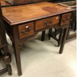 A George III mahogany lowboy, the plain top above three drawers on square legs,