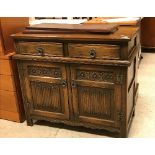 An Old Charm oak side cabinet with two drawers and two linenfold cupboard doors and a 1930's walnut