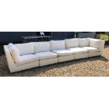 An OKA Direct five section cream corner sofa on black wooden feet CONDITION REPORTS