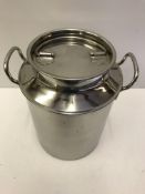 A modern miniature stainless steel milk churn