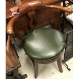 An early 20th Century mahogany framed swivel chair,