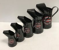 A set of five modern graduated painted metal oil cans bearing labels "Harley Davidson Motocycles