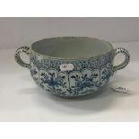 An 18th century Delft twin-handled broth bowl,
