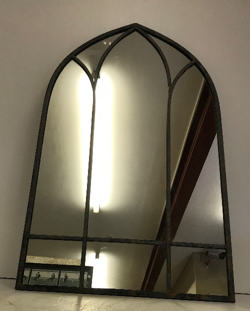 A leaded effect Gothic style garden mirror,