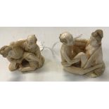 A 19th Century Japanese Meji Period carved ivory erotic netsuke as two lovers signed to base and
