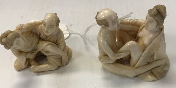 A 19th Century Japanese Meji Period carved ivory erotic netsuke as two lovers signed to base and